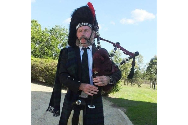 Bagpiper Haggis McNeil logo