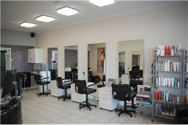 Classique Hair Designs logo